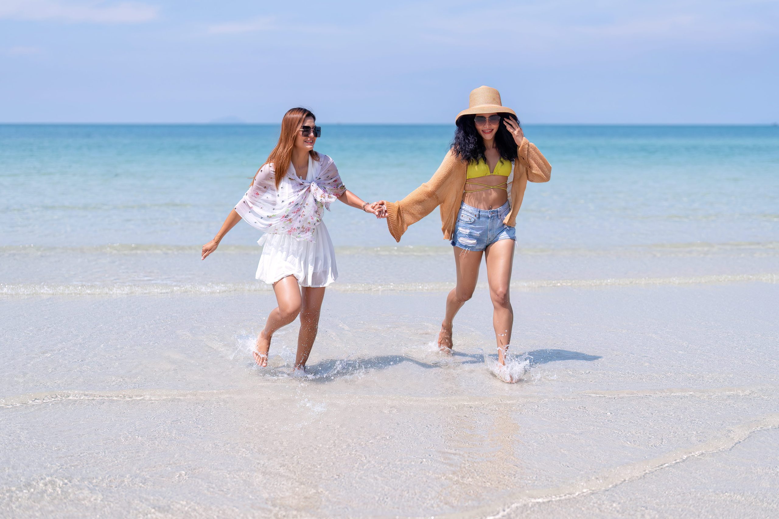 Friends enjoying a Florida fall beach vacation with Beach Ride Rental